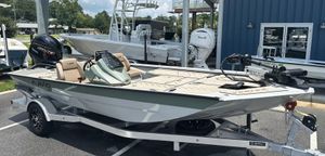 Avid 18 Vertex 2025 Avid 18 Vertex boat on trailer, featuring Yamaha engine, parked outdoors.