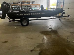 Tracker Panfish 17 2025 Tracker Panfish 17 boat on trailer in a garage setting.