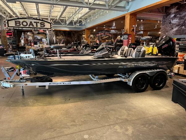 Ranger ALPHA 208 2025 Ranger ALPHA 208 boat on display in showroom with trailer.