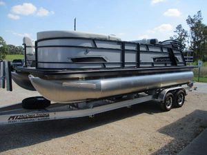 Starcraft EXS-3DL 2025 Starcraft EXS-3DL pontoon boat on trailer, parked outdoors.