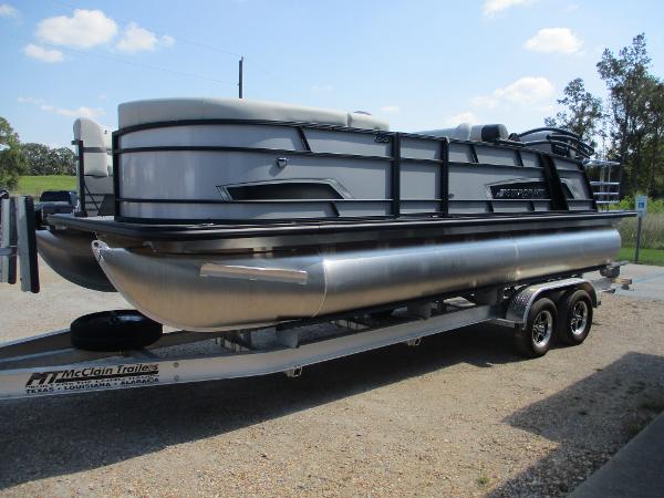 Starcraft EXS-3DL 2025 Starcraft EXS-3DL pontoon boat on trailer, parked outdoors.