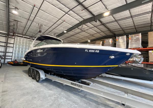 Regal 3200 Bowrider 2016 Regal 3200 Bowrider boat on trailer in storage facility.