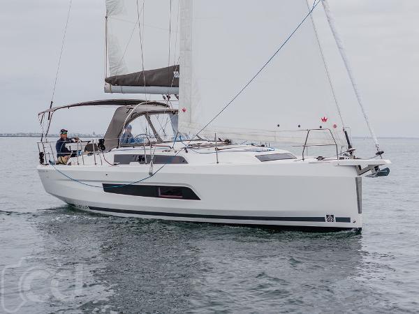 Dufour 37 2023 Dufour 37 sailboat cruising on calm waters.