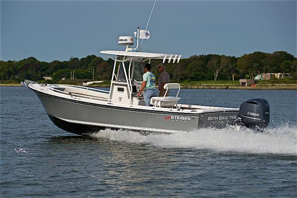 Steiger Craft 255DV LONG BEACH CC 2024 Steiger Craft 255DV Long Beach CC boat cruising on water.