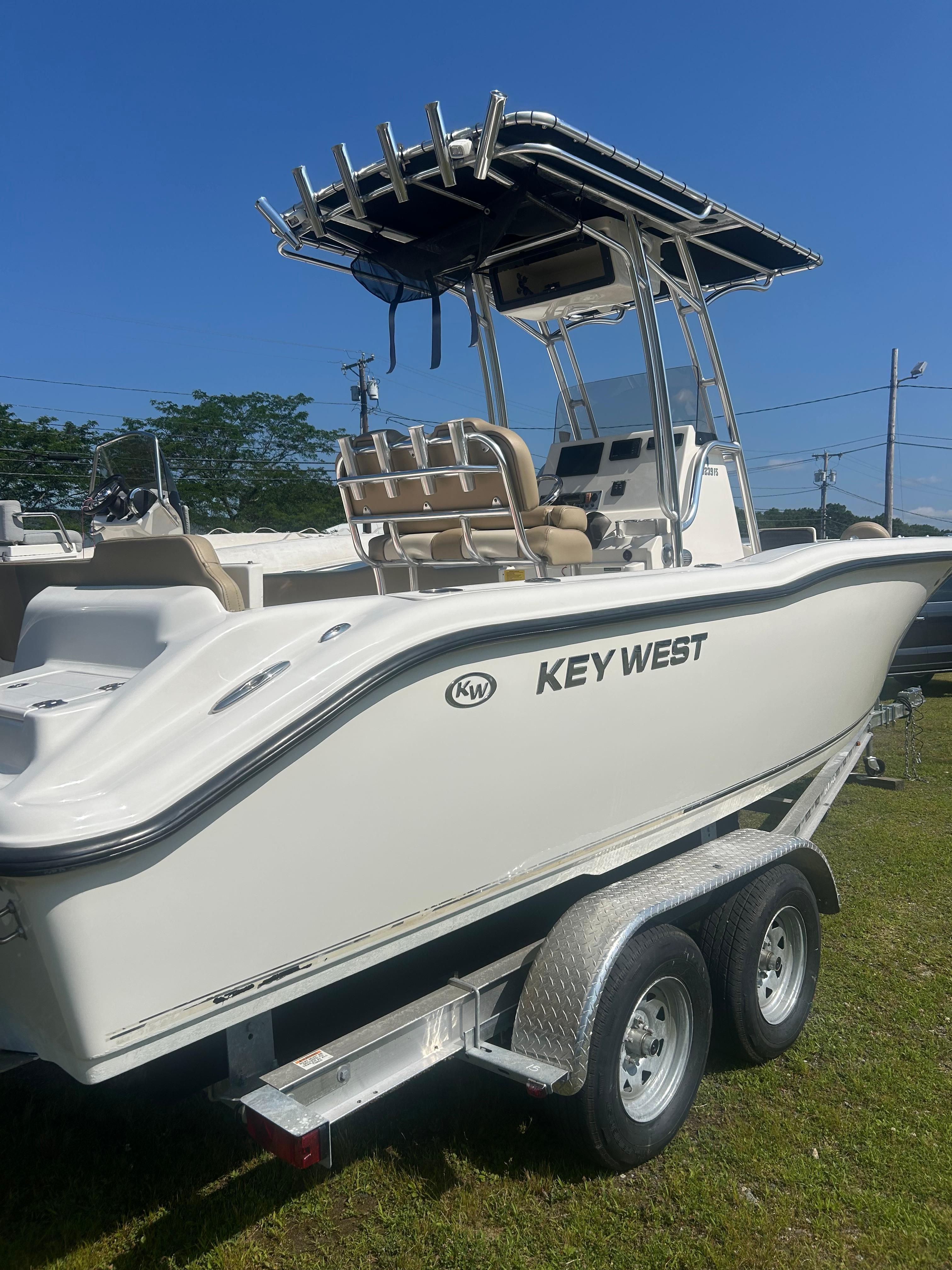 Key West 239 FS 2022 Key West 239 FS boat on trailer, sunny day, side view.