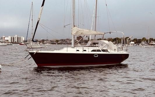 Catalina 36 MkII 2003 Catalina 36 MkII sailboat anchored in a calm harbor.