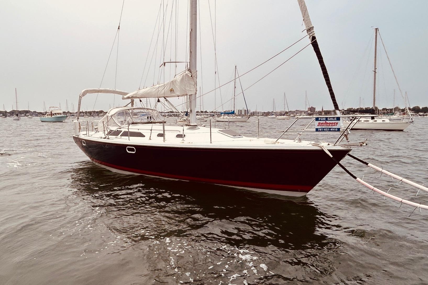 Catalina 36 MkII 2003 Catalina 36 MkII sailboat for sale, anchored in a marina.