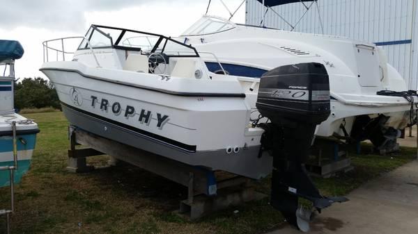 Bayliner Trophy 1994 Bayliner Trophy boat with outboard motor on dry dock.
