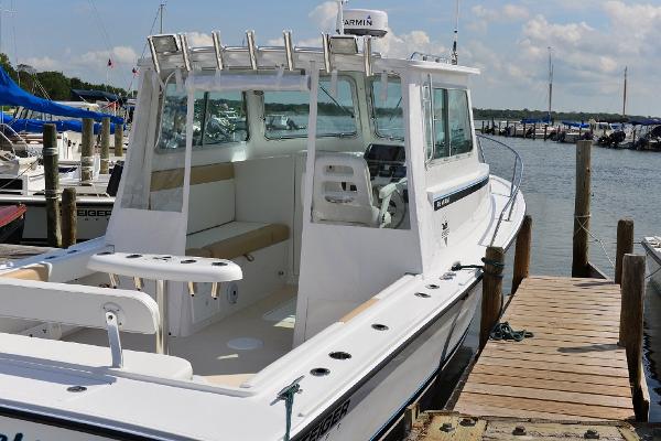 Steiger Craft 28 Fisherman 2024 Steiger Craft 28 Fisherman docked at a marina.