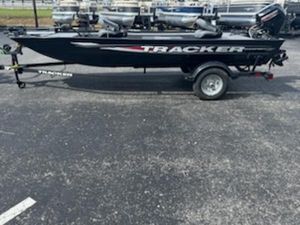 Tracker Panfish 17 2025 Tracker Panfish 17 boat on trailer, black exterior, parked outdoors.