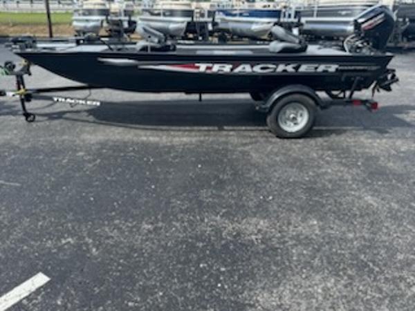 Tracker Panfish 17 2025 Tracker Panfish 17 boat on trailer, black exterior, parked outdoors.