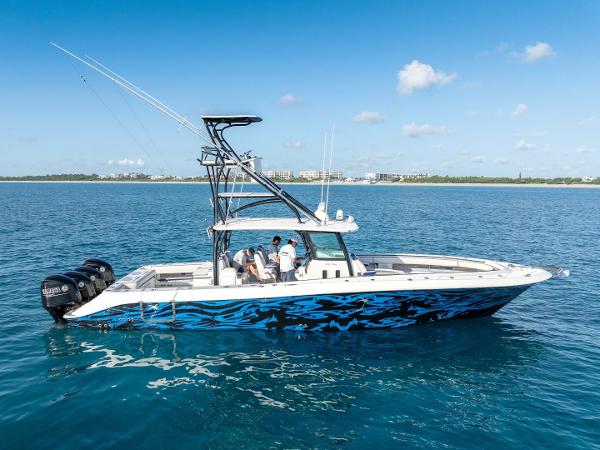 Hydra-Sports 42 Custom Siesta 2014 Hydra-Sports 42 Custom Siesta boat on clear blue water.