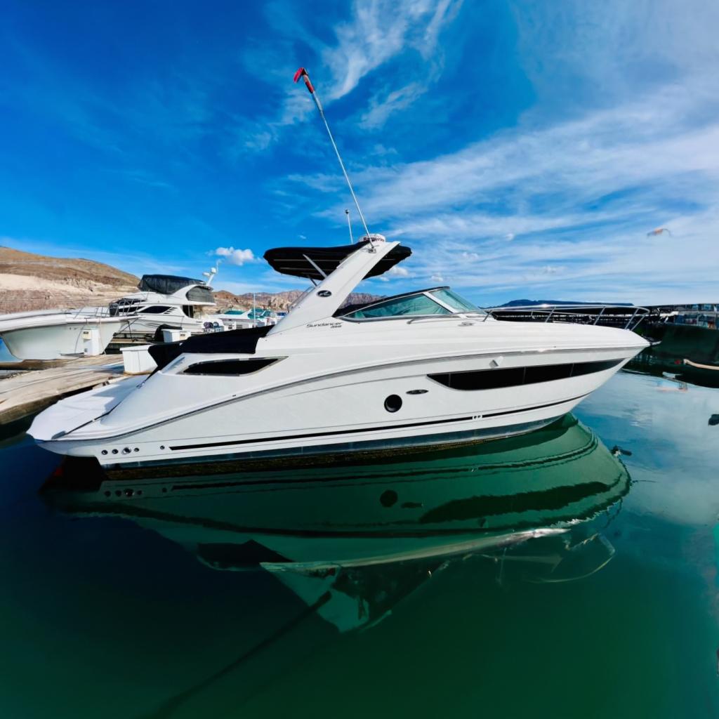 Sea Ray 350 Sundancer 2016 Sea Ray 350 Sundancer yacht docked on a sunny day.