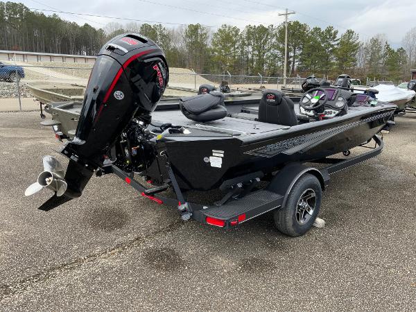 Ranger RT188P 2025 Ranger RT188P fishing boat with outboard motor, parked on a trailer.