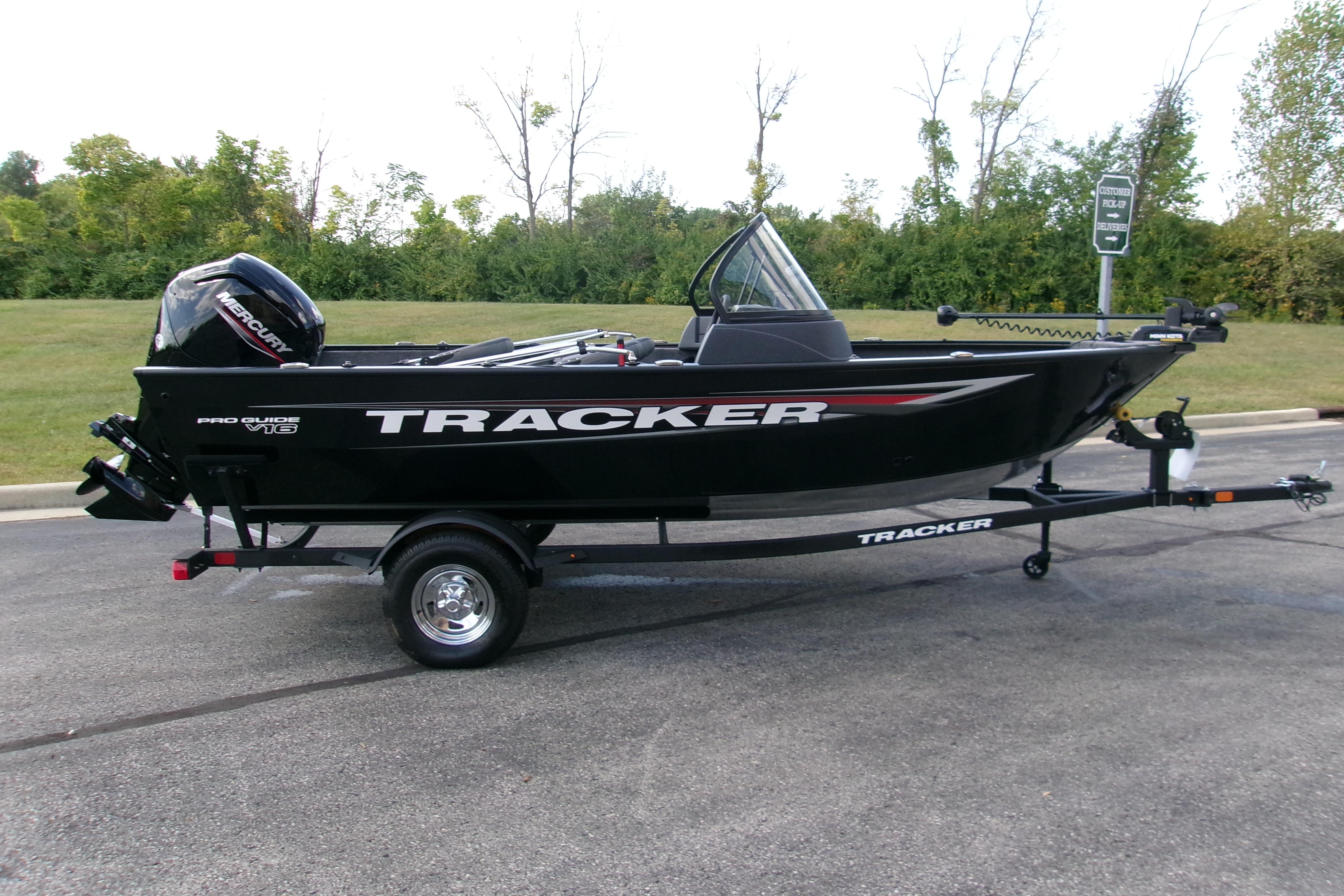 Tracker Pro Guide V-16 WT 2026 Tracker Pro Guide V-16 WT boat on trailer, parked outdoors.
