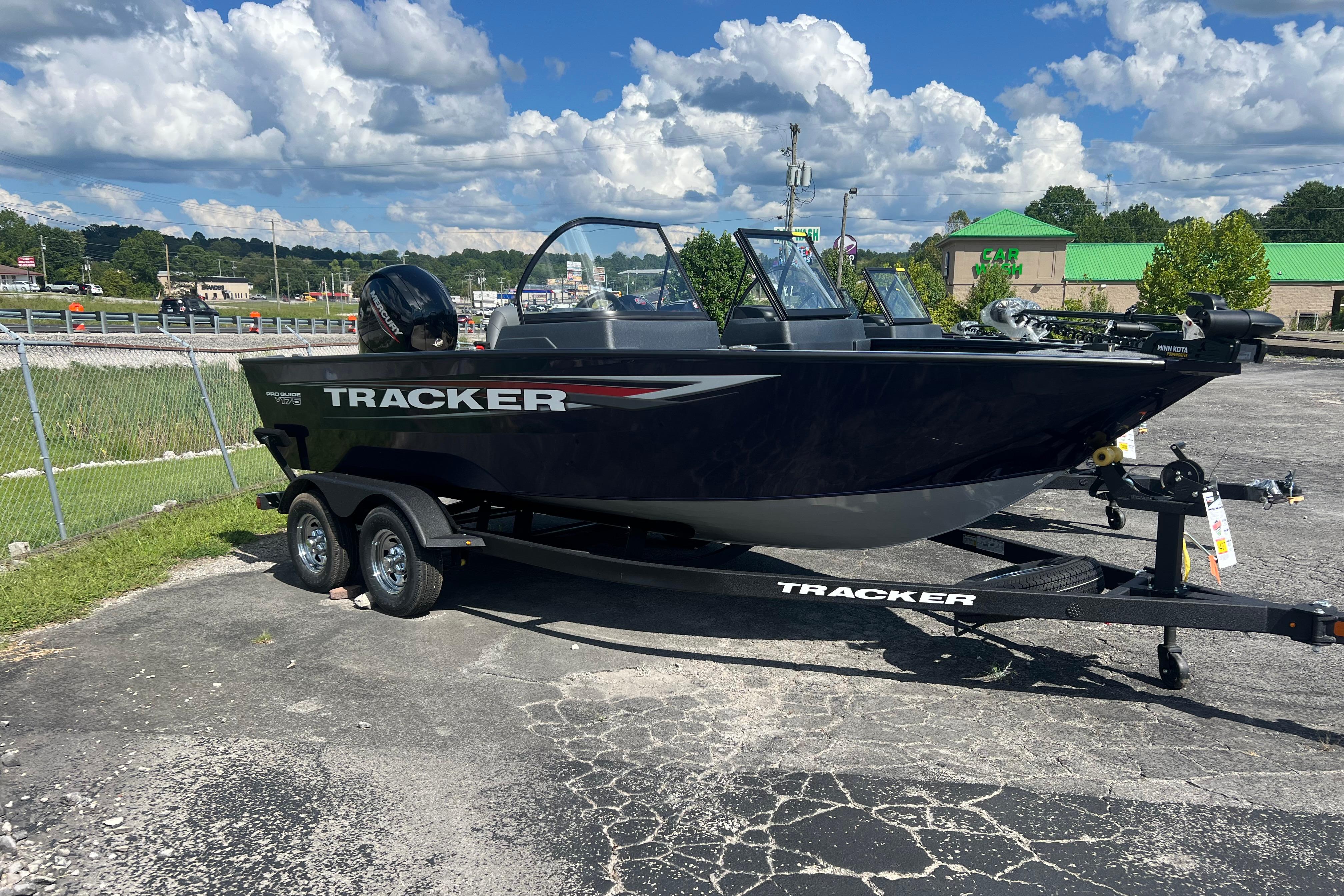 Tracker Pro Guide V-175 WT 2026 Tracker Pro Guide V-175 WT boat on trailer under a blue sky.