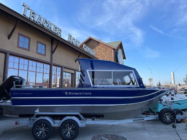 Spartan 200 Astoria 2024 Spartan 200 Astoria boat on trailer outside Tracker Boat Center.