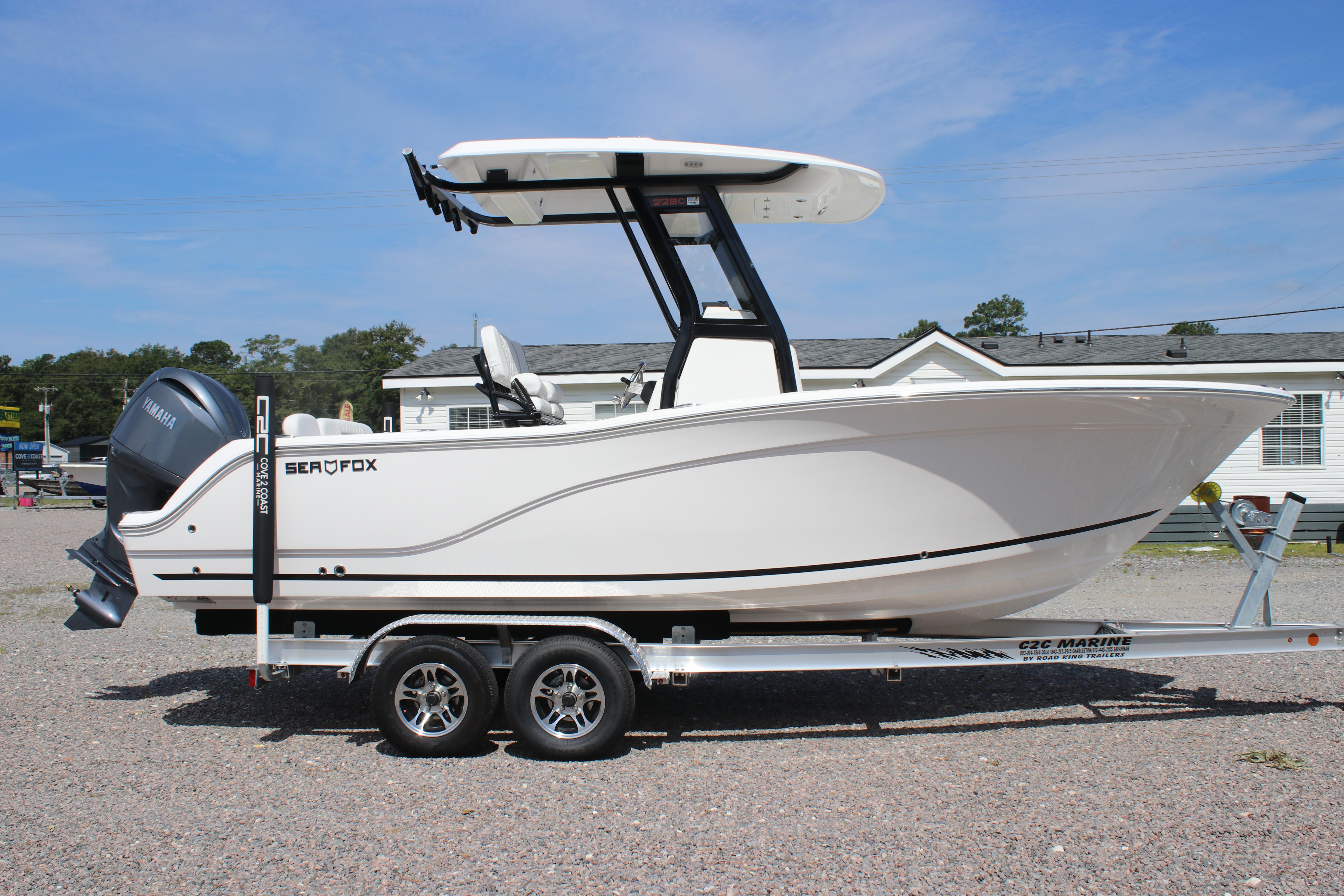 Sea Fox 228 Commander 2026 Sea Fox 228 Commander boat on trailer, side view, outdoors.