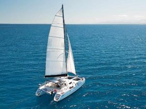 Fountaine Pajot Venezia 42 Sailing catamaran Fountaine Pajot Venezia 42, 1994 model, cruising on open blue sea.