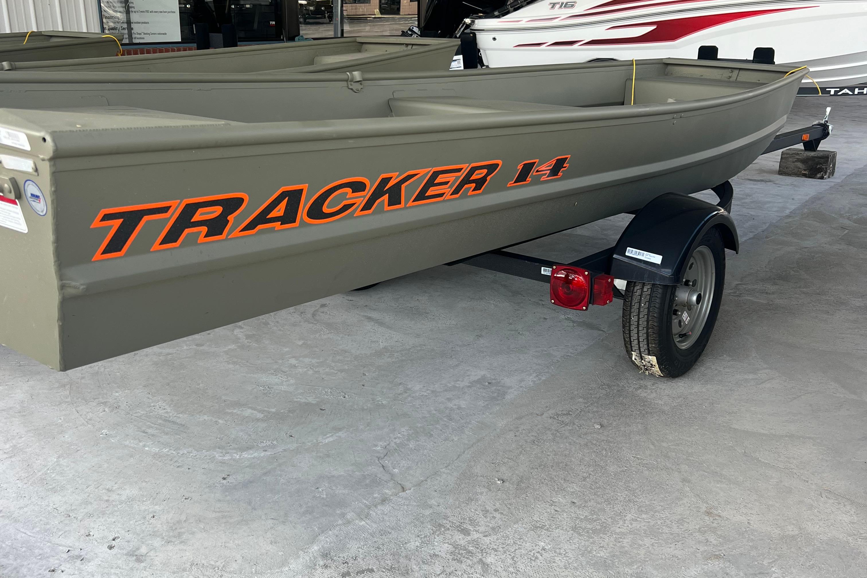 Tracker Grizzly 14 Jon 2026 Tracker Grizzly 14 Jon boat on trailer, displayed indoors.