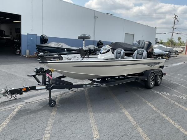 Ranger ALPHA 208 2025 Ranger ALPHA 208 boat on trailer outside a warehouse.
