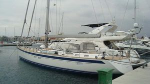Hallberg-Rassy 64 Luxury 2012 Hallberg-Rassy 64 yacht docked in marina, showcasing elegant design.