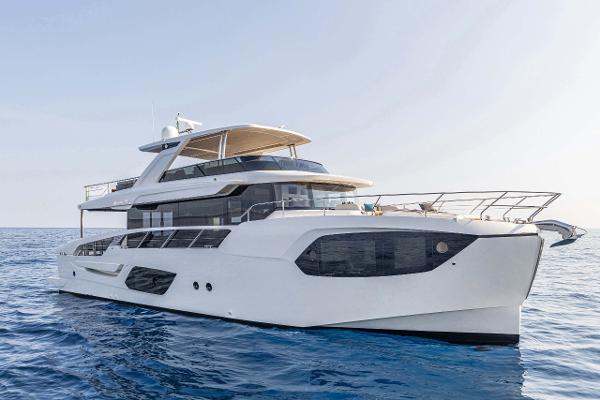 Absolute 70' Navetta Luxurious 2026 Absolute 70' Navetta yacht cruising on calm blue waters.