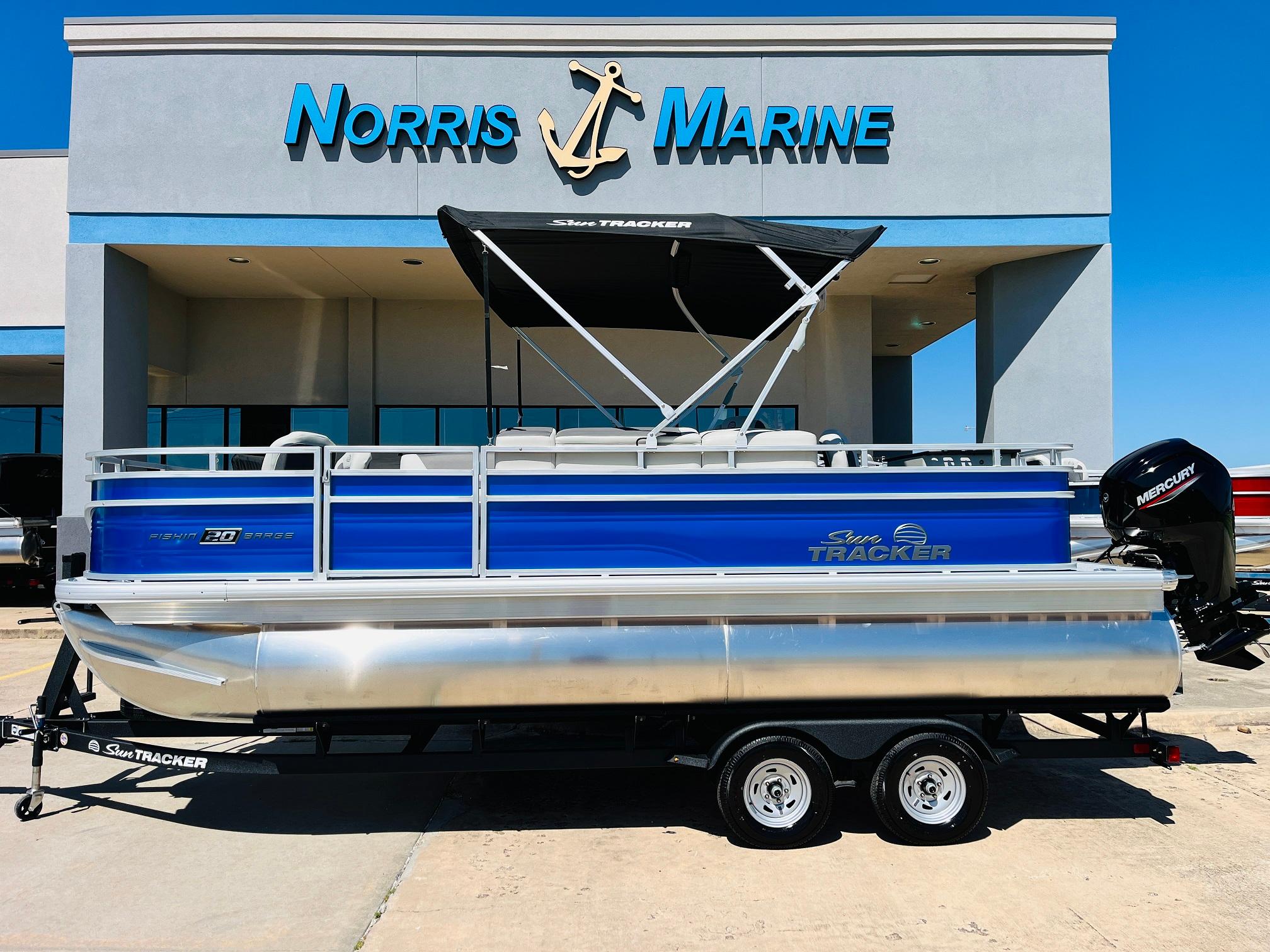 Sun Tracker Fishin' Barge 20 DLX 2026 Sun Tracker Fishin' Barge 20 DLX pontoon boat at Norris Marine dealership.