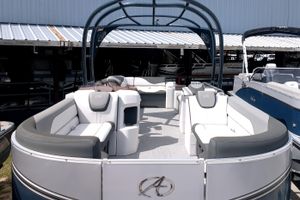 Avalon LSZ ELITE 2023 Avalon LSZ ELITE pontoon boat with luxurious seating and sleek design.