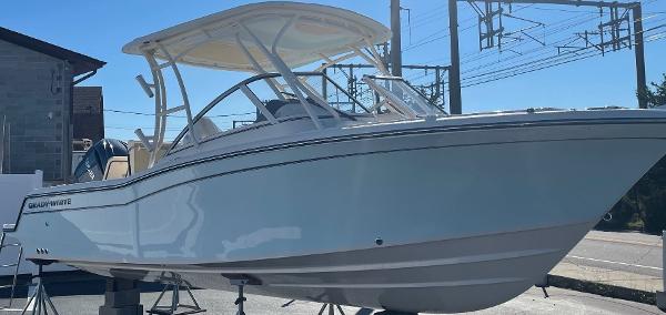 Grady-White Freedom 235 2024 Grady-White Freedom 235 boat on display outdoors.