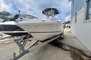 Robalo R200 Center Console 2017 Robalo R200 Center Console boat on trailer, parked outdoors.