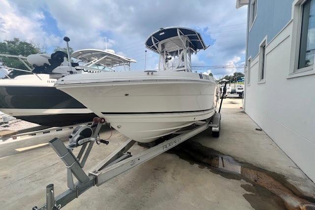 Robalo R200 Center Console 2017 Robalo R200 Center Console boat on trailer, parked outdoors.