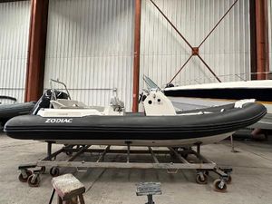 Zodiac Medline 6.8 BLC 2023 Zodiac Medline 6.8 BLC boat in a warehouse, side view.