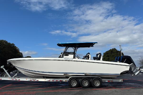 Fountain 34 SC 2024 Fountain 34 SC boat on trailer under blue sky.