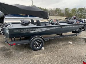 Ranger RT198P 2025 Ranger RT198P fishing boat on trailer, sleek design, parked outdoors.