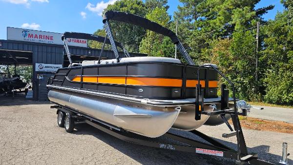Bentley Pontoons Legacy 243 Swingback 2025 Bentley Pontoons Legacy 243 Swingback on trailer, parked outside marine dealership.