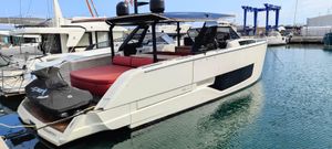 Cranchi A46 Luxury Tender 2022 Cranchi A46 Luxury Tender docked at marina, featuring sleek design and red seating.