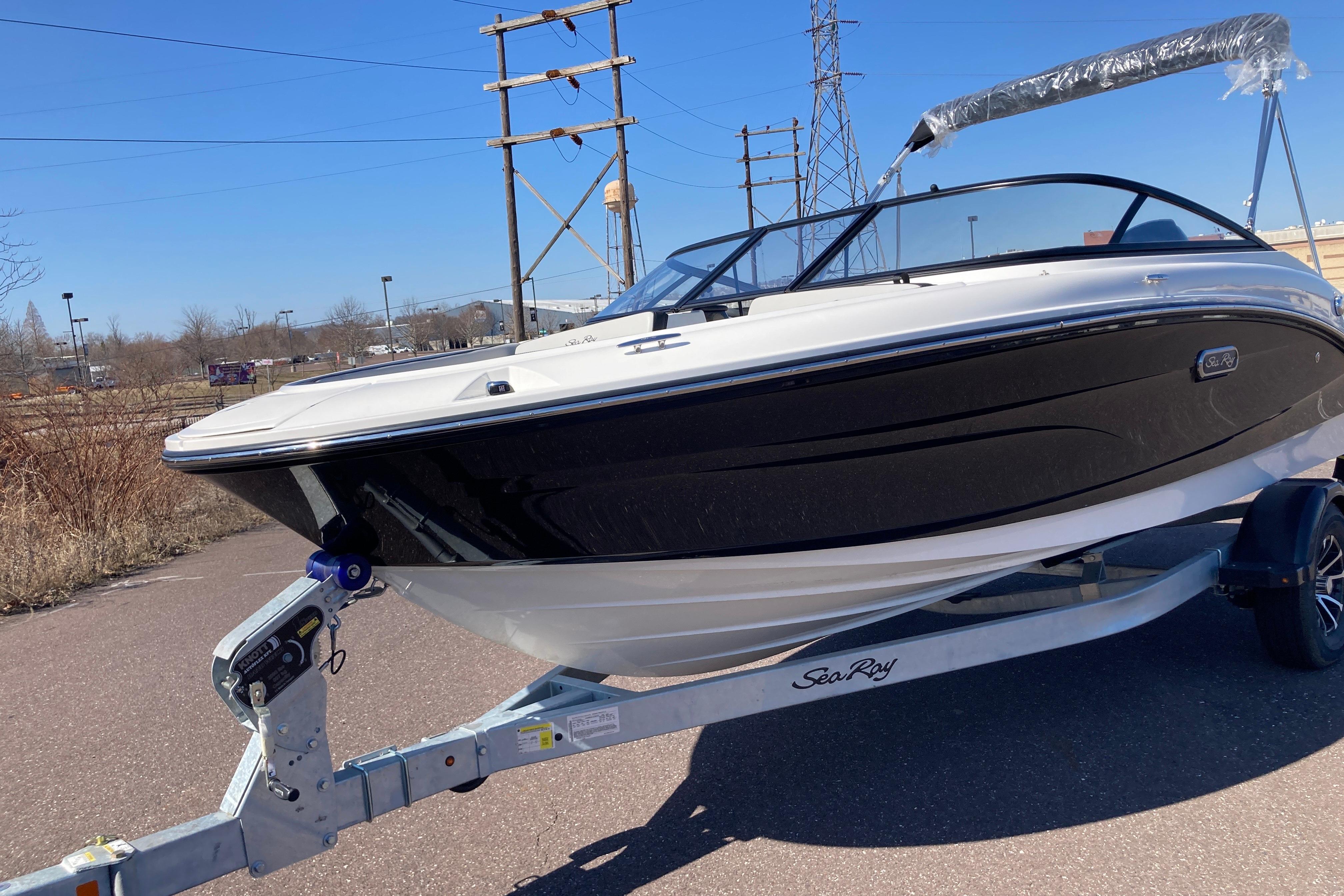 Sea Ray SPX 190 Outboard 2025 Sea Ray SPX 190 Outboard boat on trailer, parked outdoors.