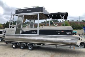 Avalon FUNSHIP 2485 2013 Avalon FUNSHIP 2485 pontoon boat on trailer, featuring upper deck and canopy.