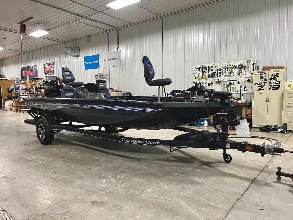 Ranger RT188P 2025 Ranger RT188P fishing boat in a garage setting.