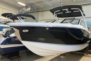 Cobalt R6 2026 Cobalt R6 boat in showroom, featuring sleek black and white design.