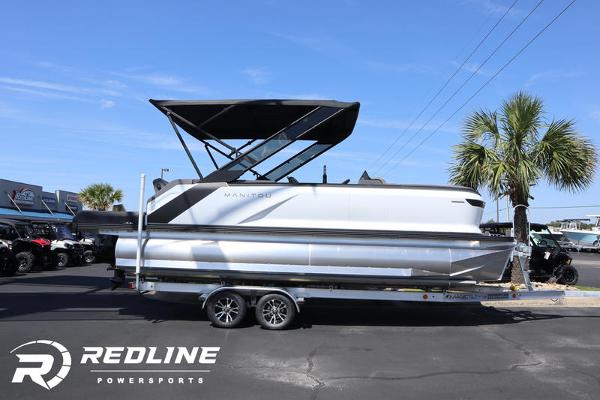 Manitou Cruise 2024 Manitou Cruise pontoon boat on trailer at Redline Powersports.
