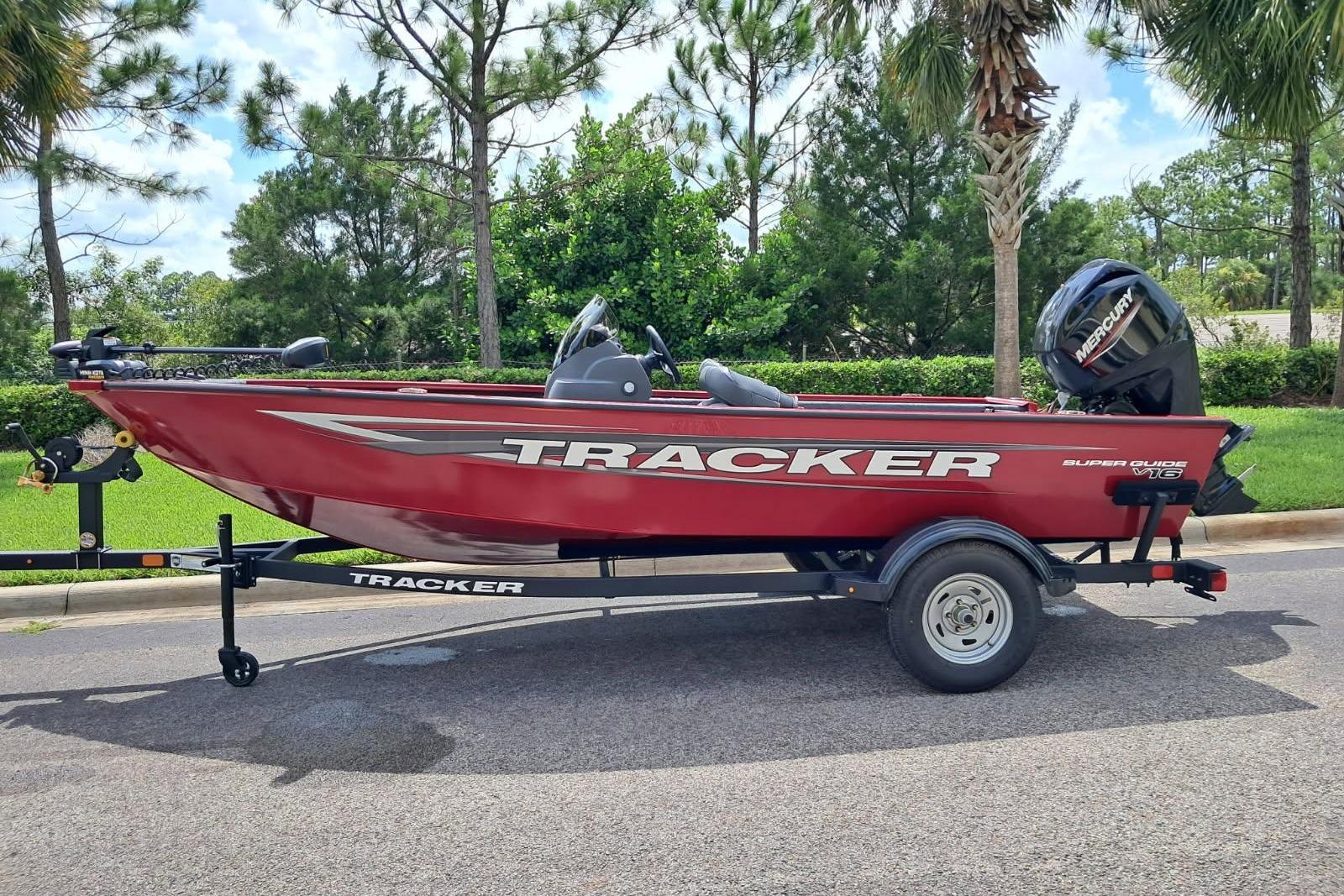 Tracker Super Guide V-16 SC 2026 Tracker Super Guide V-16 SC boat on trailer, parked outdoors.