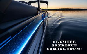 Premier 230 INTRIGUE RLO-CL 2026 Premier 230 Intrigue RLO-CL boat on water at sunset, "Premier Intrigue Coming Soon!" text.
