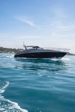 Riva 52' Rivale Luxury 2003 Riva 52' le yacht cruising on clear blue waters.