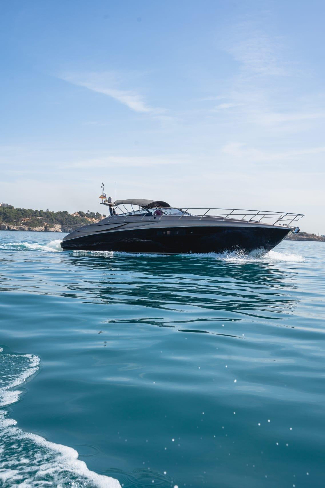 Riva 52' le Luxury 2003 Riva 52' le yacht cruising on clear blue waters.