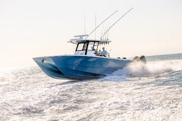 Invincible 36 Catamaran 2025 Invincible 36 Catamaran cruising on open water, showcasing sleek design and performance.