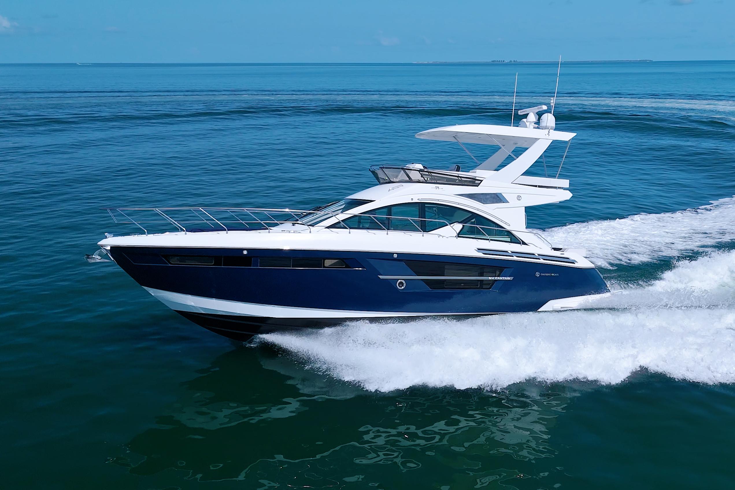Cruisers Yachts 54 Fly 2018 Cruisers Yachts 54 Fly cruising on open water, showcasing sleek design and luxury.