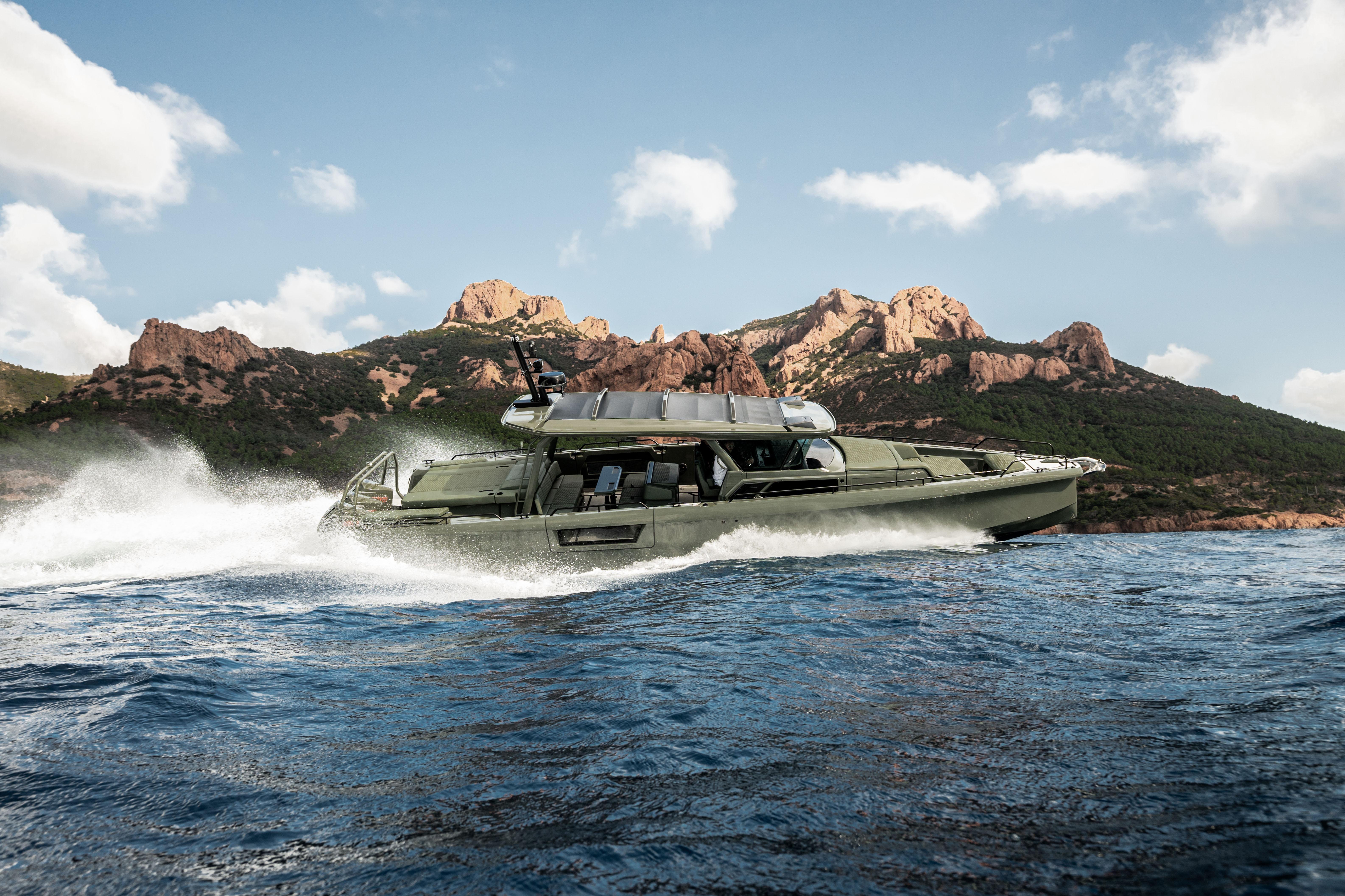 BRABUS 1500 Cross Top BRABUS 1500 Cross Top 2025 cruising on water with scenic mountain backdrop.