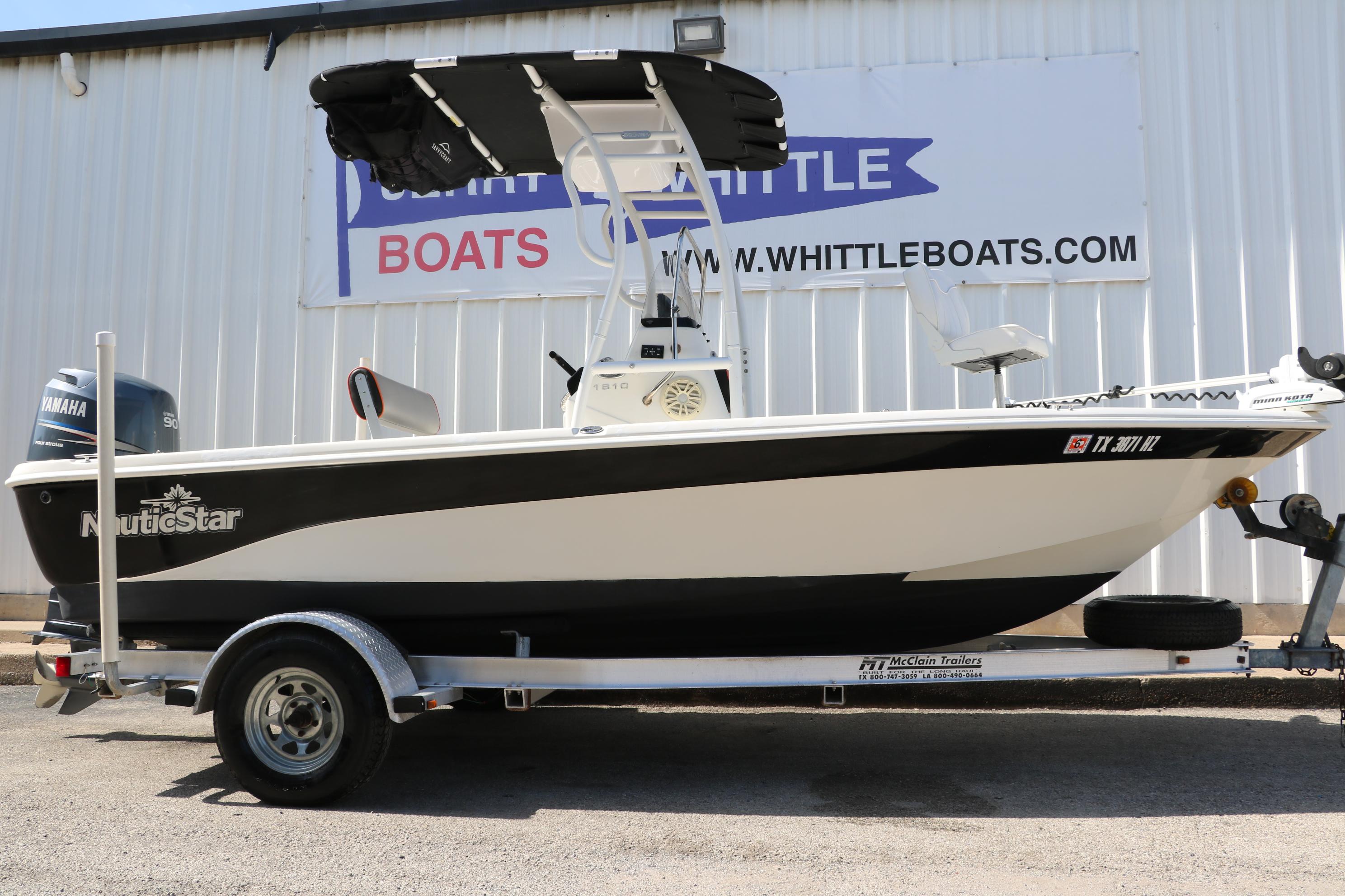 NauticStar 1810 Nautic Bay 2009 NauticStar 1810 Nautic Bay boat on trailer, displayed at Whittle Boats dealership.